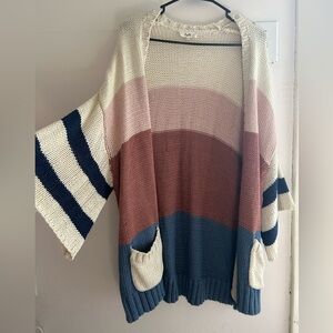 Quarter length sleeve oversized sweater